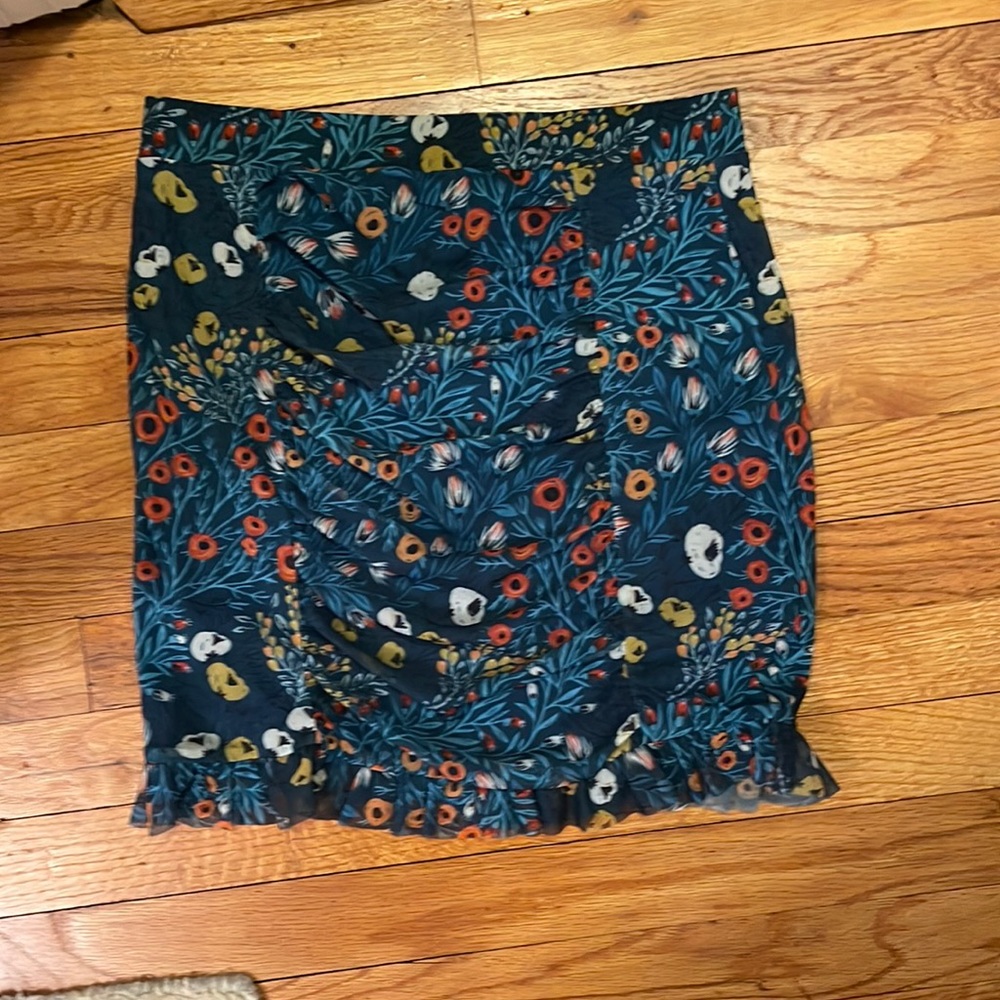 Blue mesh mini skirt with ruffle trim. Free People Size Medium